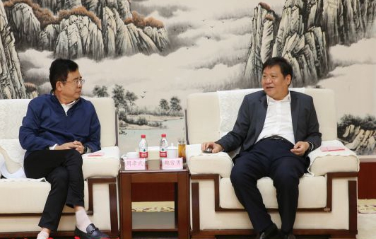 鲍常勇会见中国电力建设集团客人周孝武一行